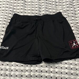 Jordan Men's Black Athletic Shorts with Red Logo